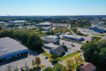 drone shot of commercial building sold by compass
